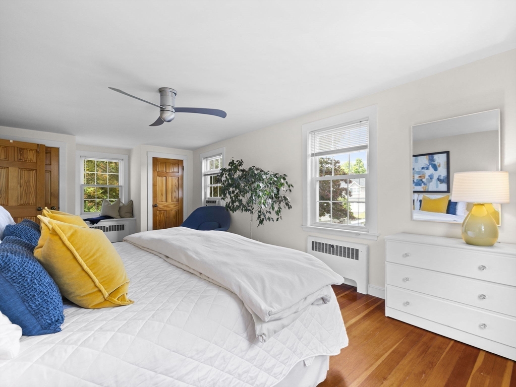 35 Winter Street Framingham, MA 01702 - Photo 13 of 22 a bedroom with a large bed and a window