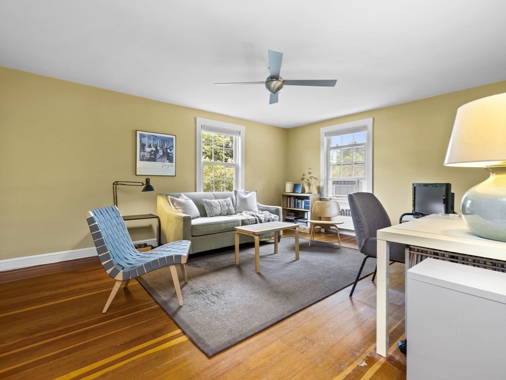 35 Winter Street Framingham, MA 01702 - Photo 16 of 22 a living room with a couch and a table