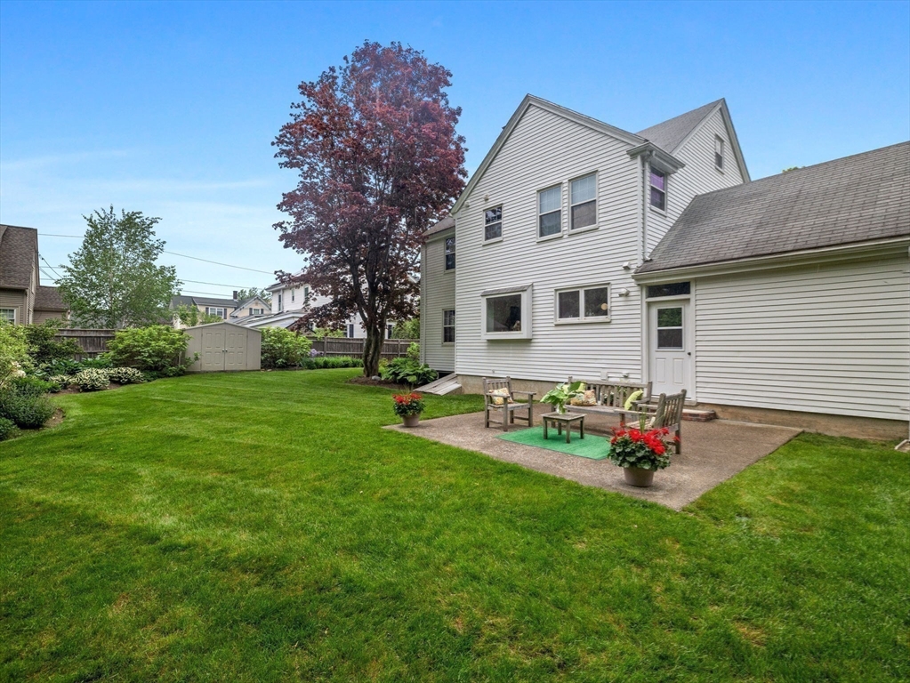 35 Winter Street Framingham, MA 01702 - Photo 20 of 22 a front view of house with yard and green space