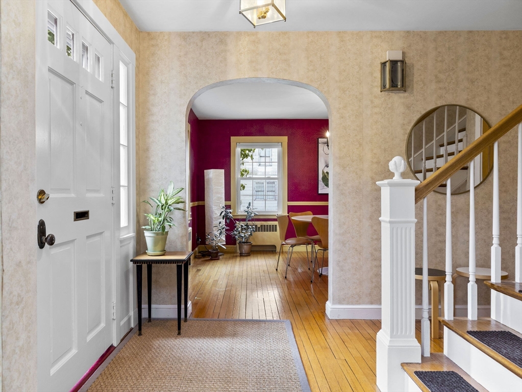 35 Winter Street Framingham, MA 01702 - Photo 2 of 22 a view of a entryway door and hallway with furniture