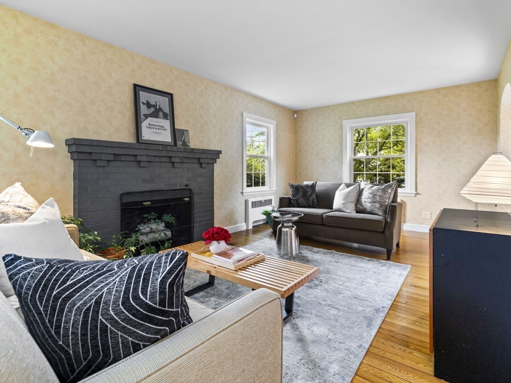 35 Winter Street Framingham, MA 01702 - Photo 6 of 22 a living room with furniture and a fireplace