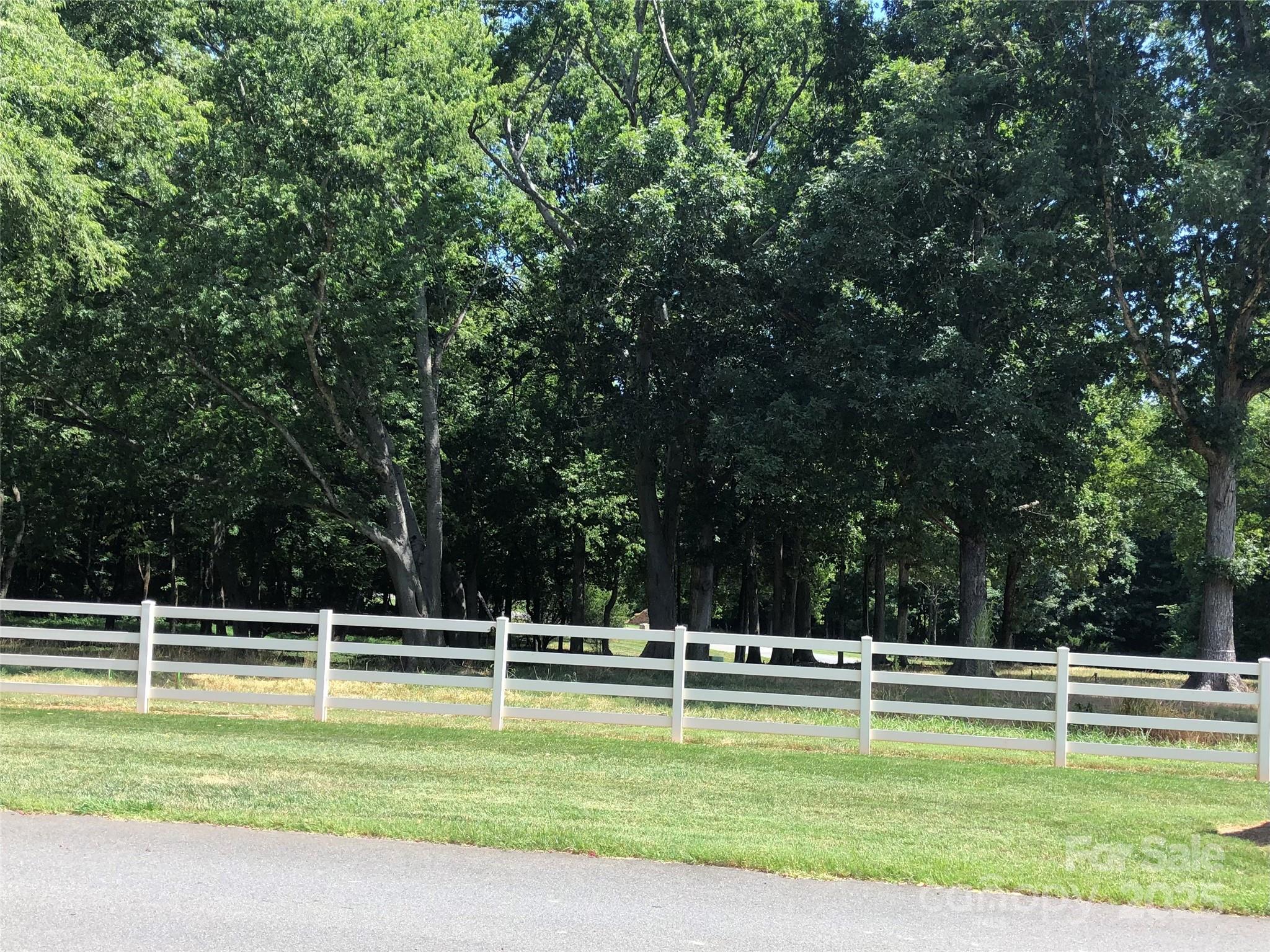 6639 Joli Cheval Lane, Unit 4 Mint Hill, NC 28227 - Photo 4 of 18 a view of a swimming pool with an outdoor space