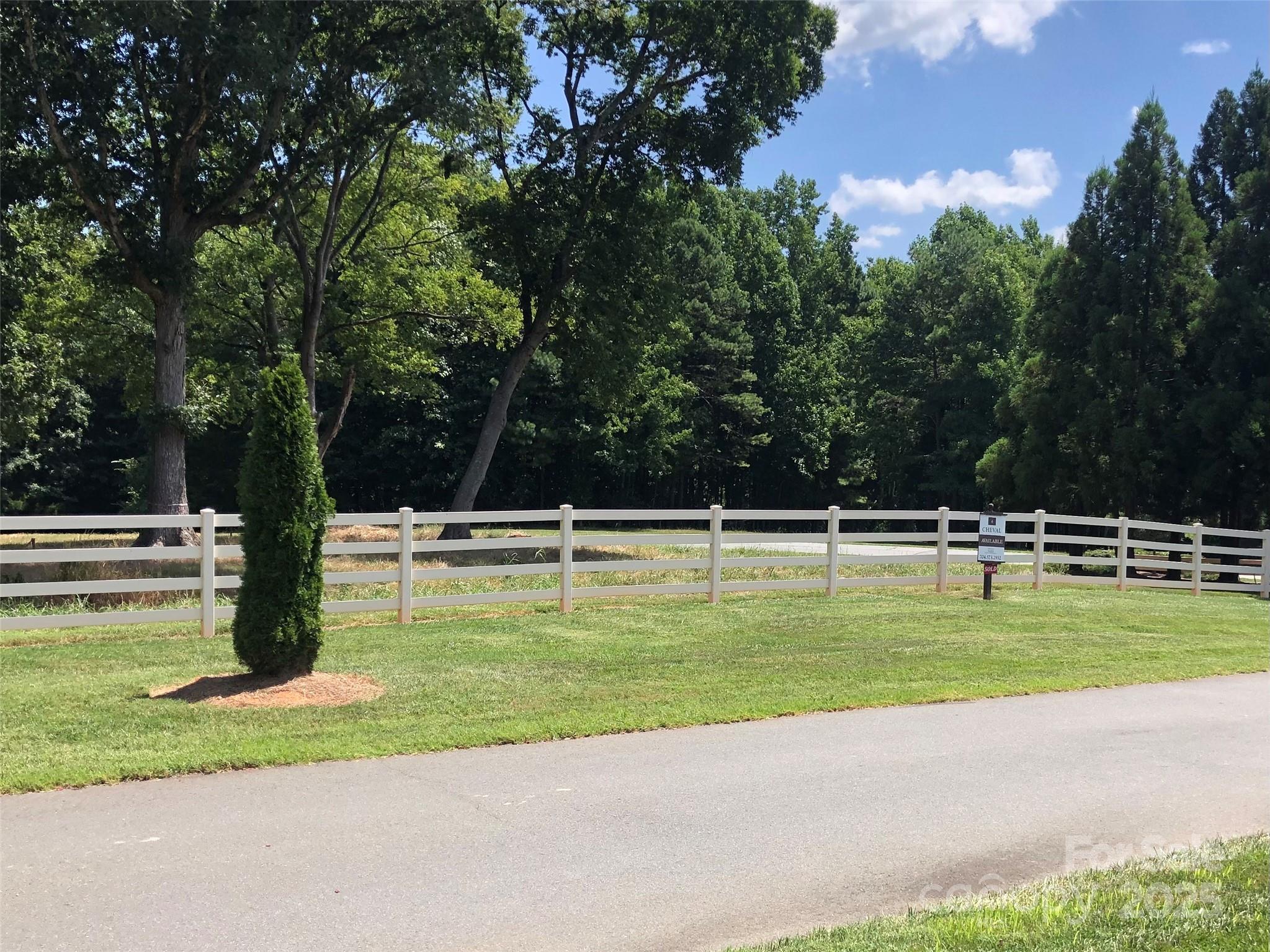 6639 Joli Cheval Lane, Unit 4 Mint Hill, NC 28227 - Photo 5 of 18 a view of a swimming pool