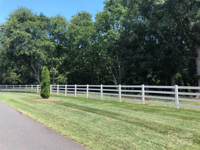a view of a swimming pool with a park