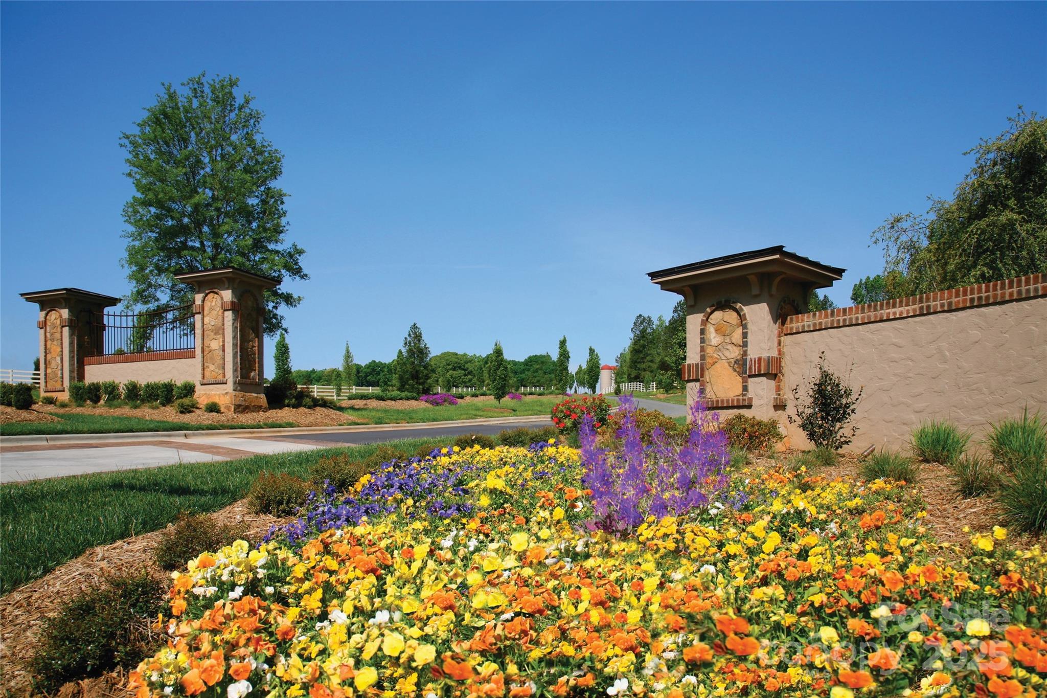 6639 Joli Cheval Lane, Unit 4 Mint Hill, NC 28227 - Photo 9 of 18 front view of a house with a yard