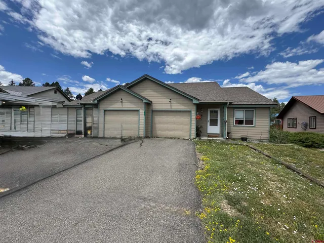 front view of house with a yard
