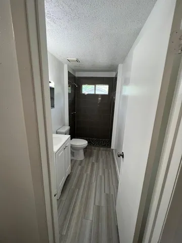 a bathroom with a sink and toilet