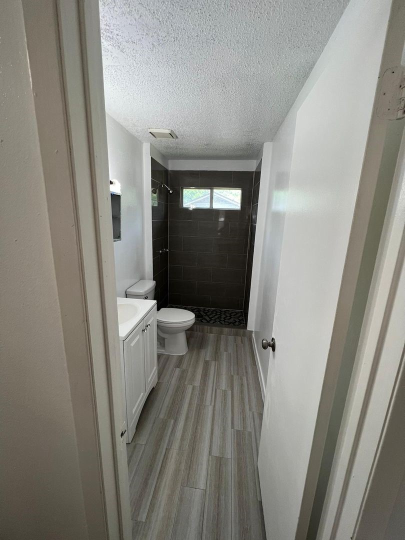 3058 Old Colony Road Huntsville, TX 77320 - Photo 7 of 14 a bathroom with a sink and toilet