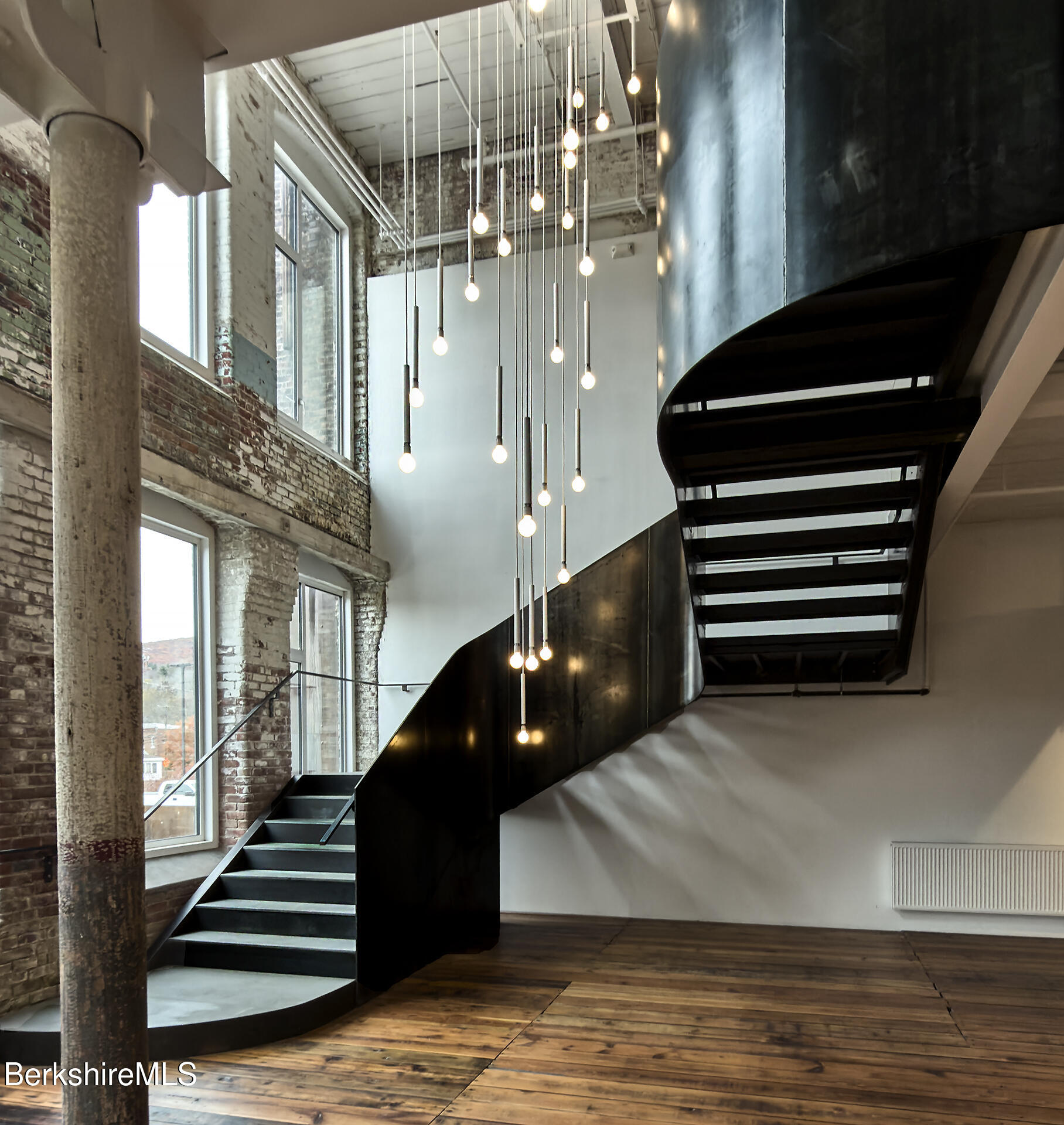 520 State Road, Unit 206 North Adams, MA 01247 - Photo 2 of 16 a view of entryway and hall with wooden floor