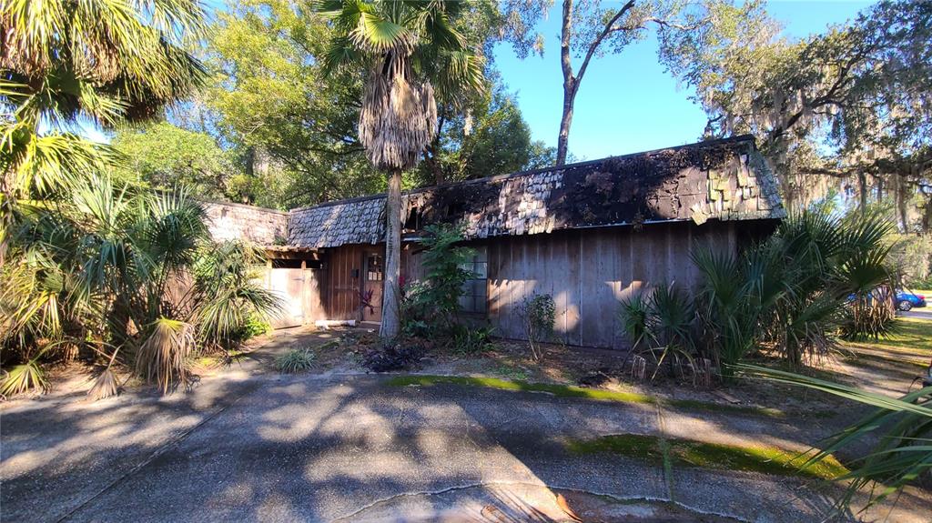 501 Hermits Trail Altamonte Springs, FL 32701 - Photo 42 of 61 a view of a street with some trees