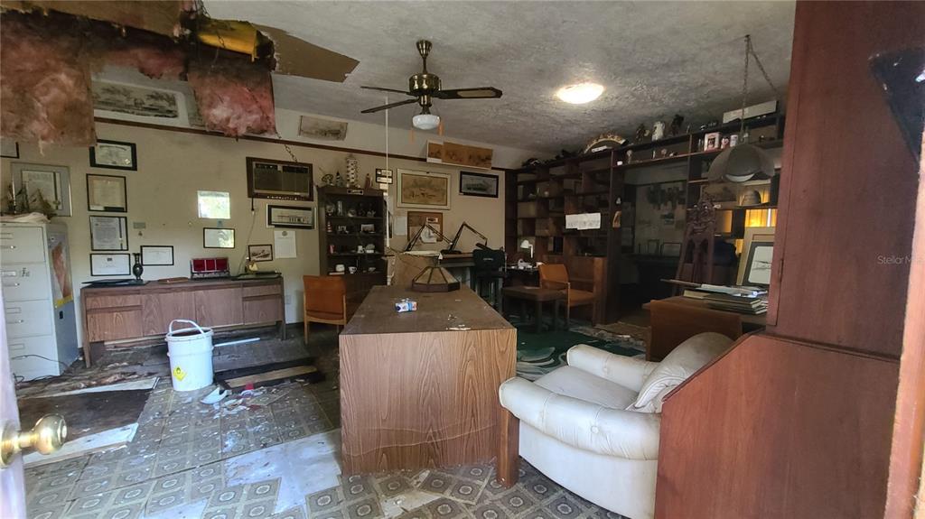 501 Hermits Trail Altamonte Springs, FL 32701 - Photo 50 of 61 a living room with furniture and a fireplace