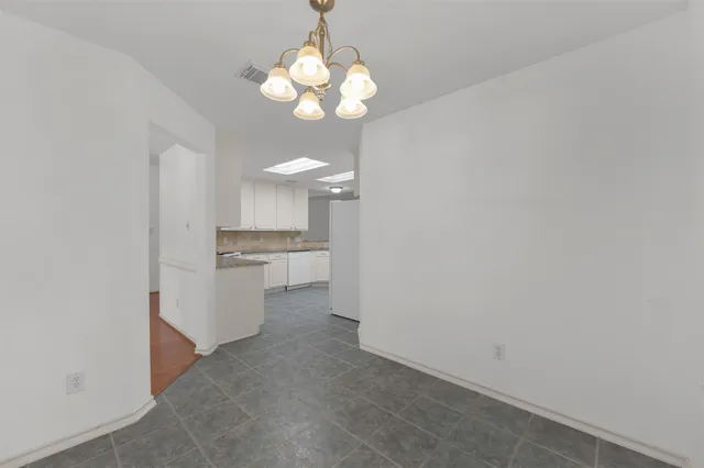 a view of a kitchen with a sink