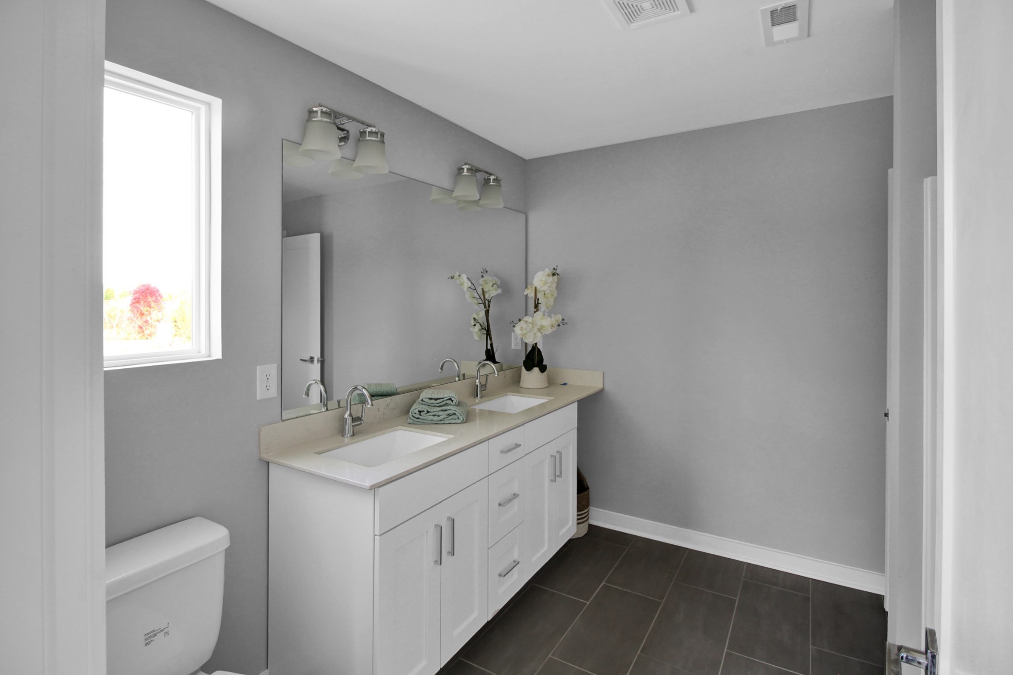 200 Jeffries Way Lebanon, TN 37087 - Photo 23 of 30 a bathroom with a double vanity sink and toilet