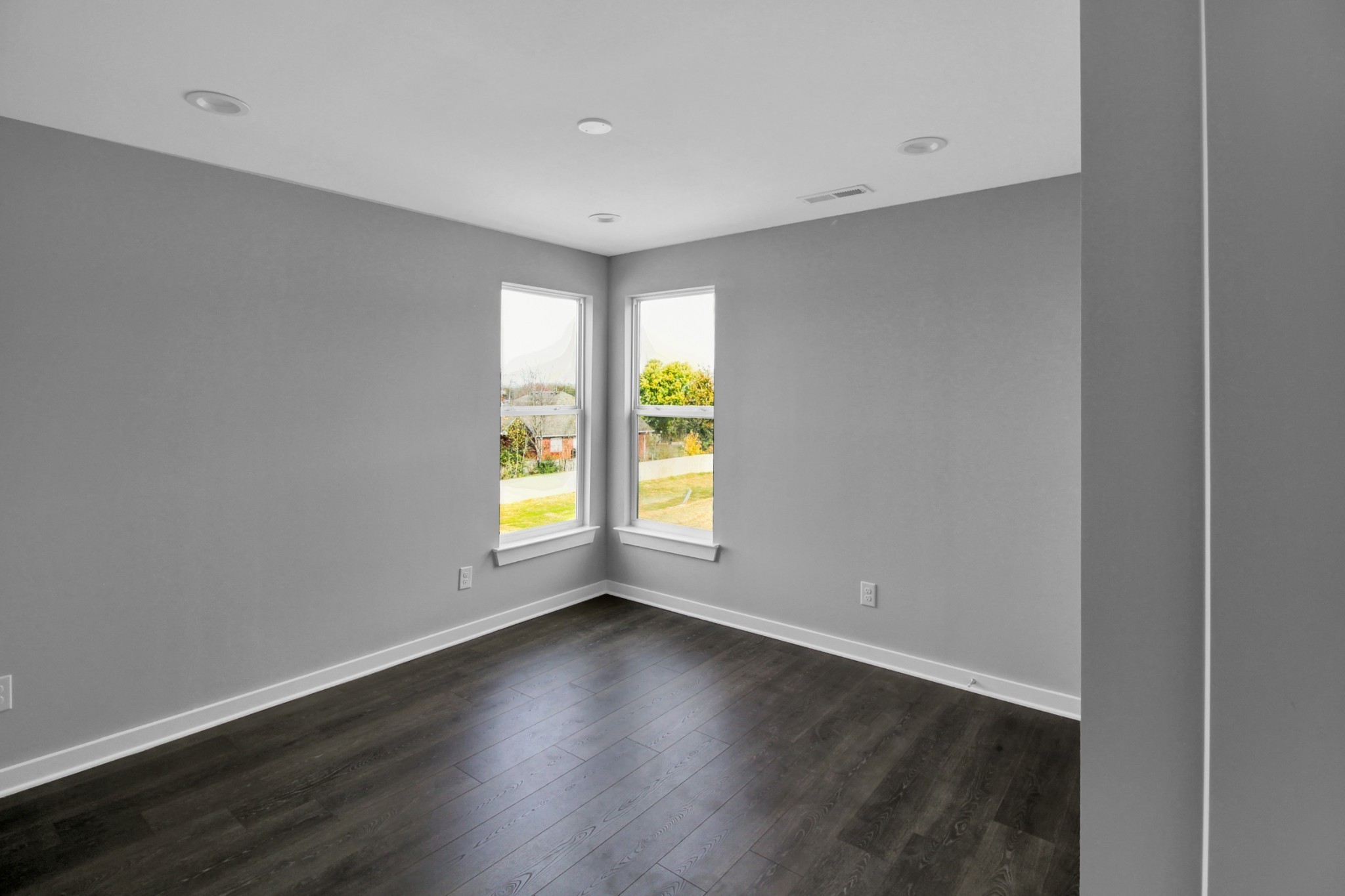 200 Jeffries Way Lebanon, TN 37087 - Photo 28 of 30 an empty room with wooden floor and windows