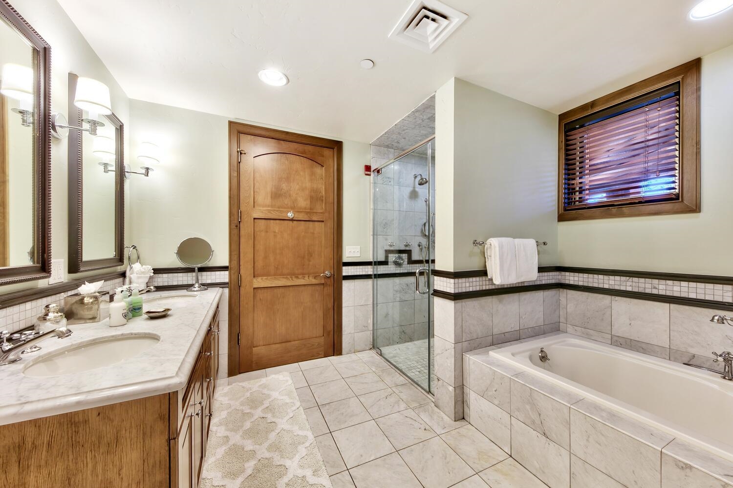 6750 North Lake Boulevard, Unit 13F Tahoe Vista, CA 96148 - Photo 8 of 20 a spacious bathroom with a tub sink and mirror