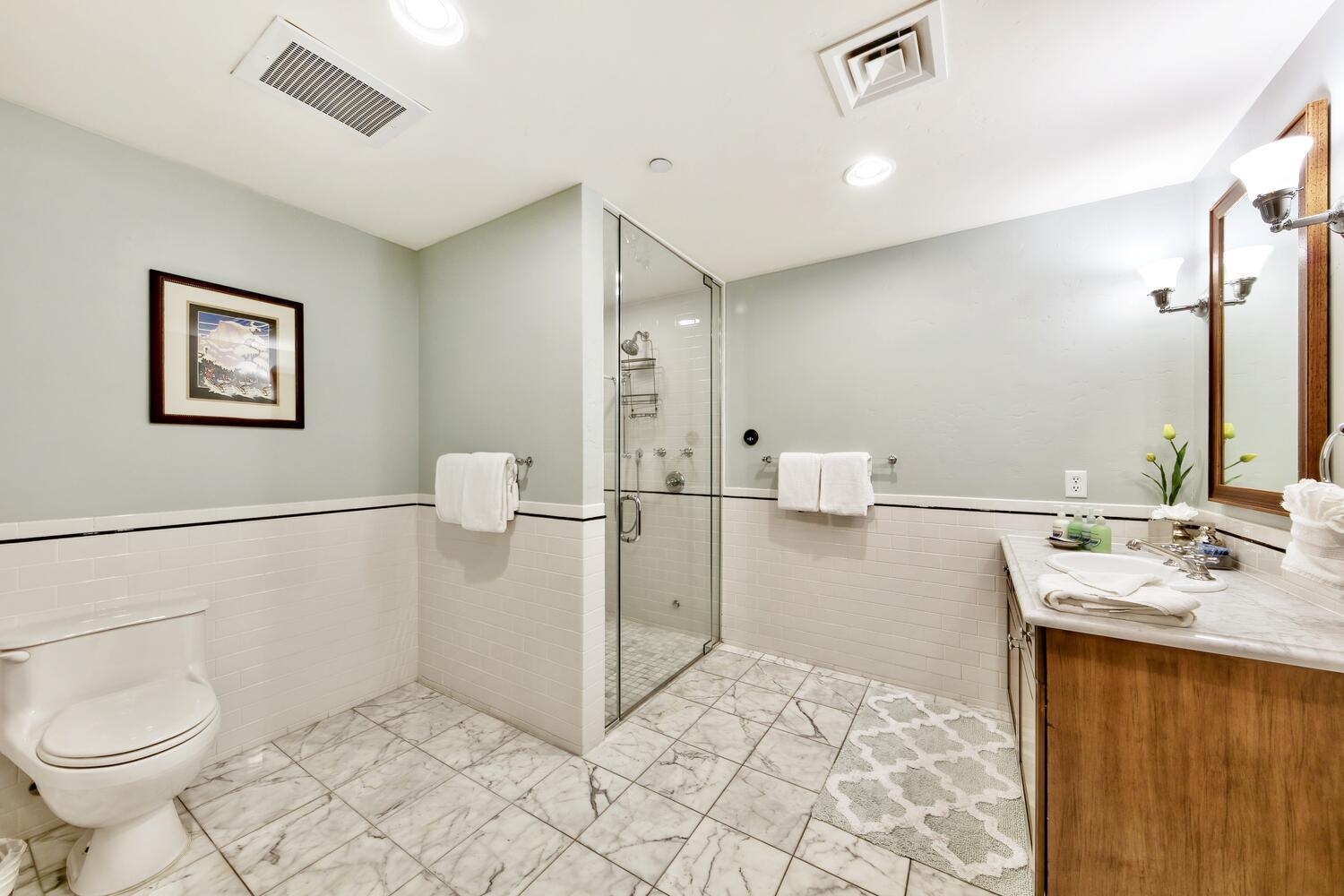 6750 North Lake Boulevard, Unit 13F Tahoe Vista, CA 96148 - Photo 9 of 20 a bathroom with a sink toilet and shower