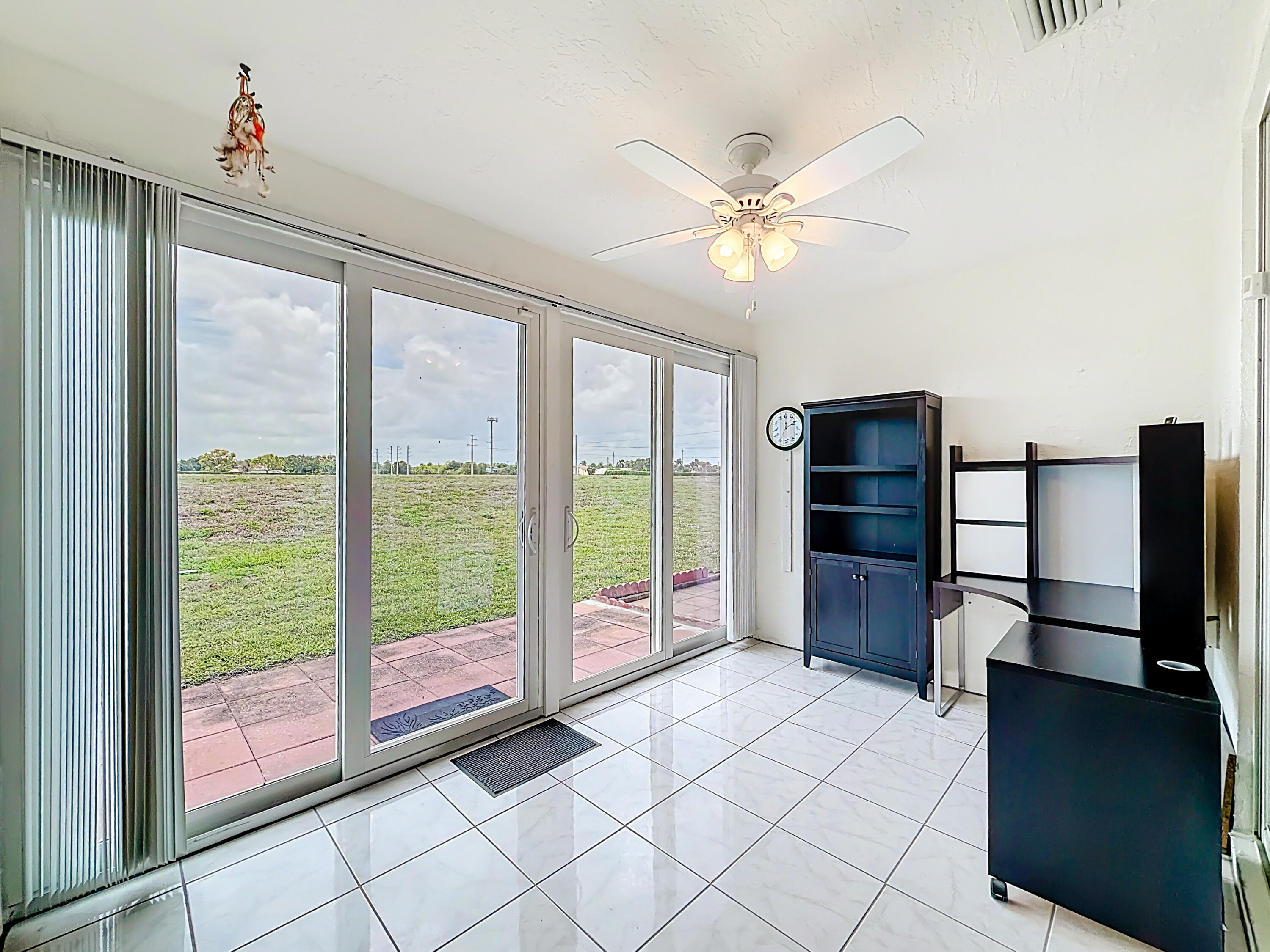 10954 Lakemore Lane Boca Raton, FL 33498 - Photo 25 of 61 a view of a kitchen with workspace and windows