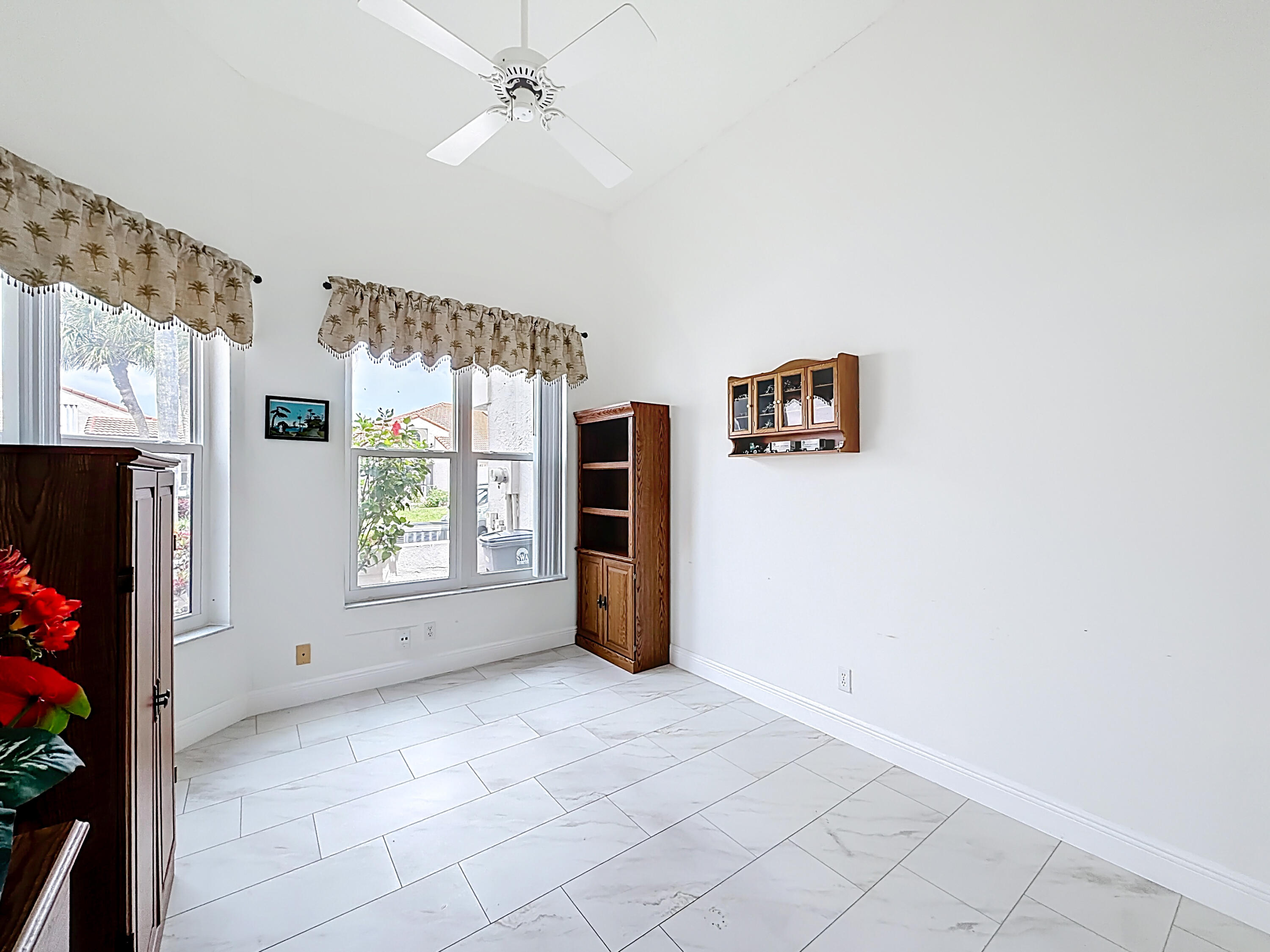 10954 Lakemore Lane Boca Raton, FL 33498 - Photo 36 of 61 a view of an empty room with a window