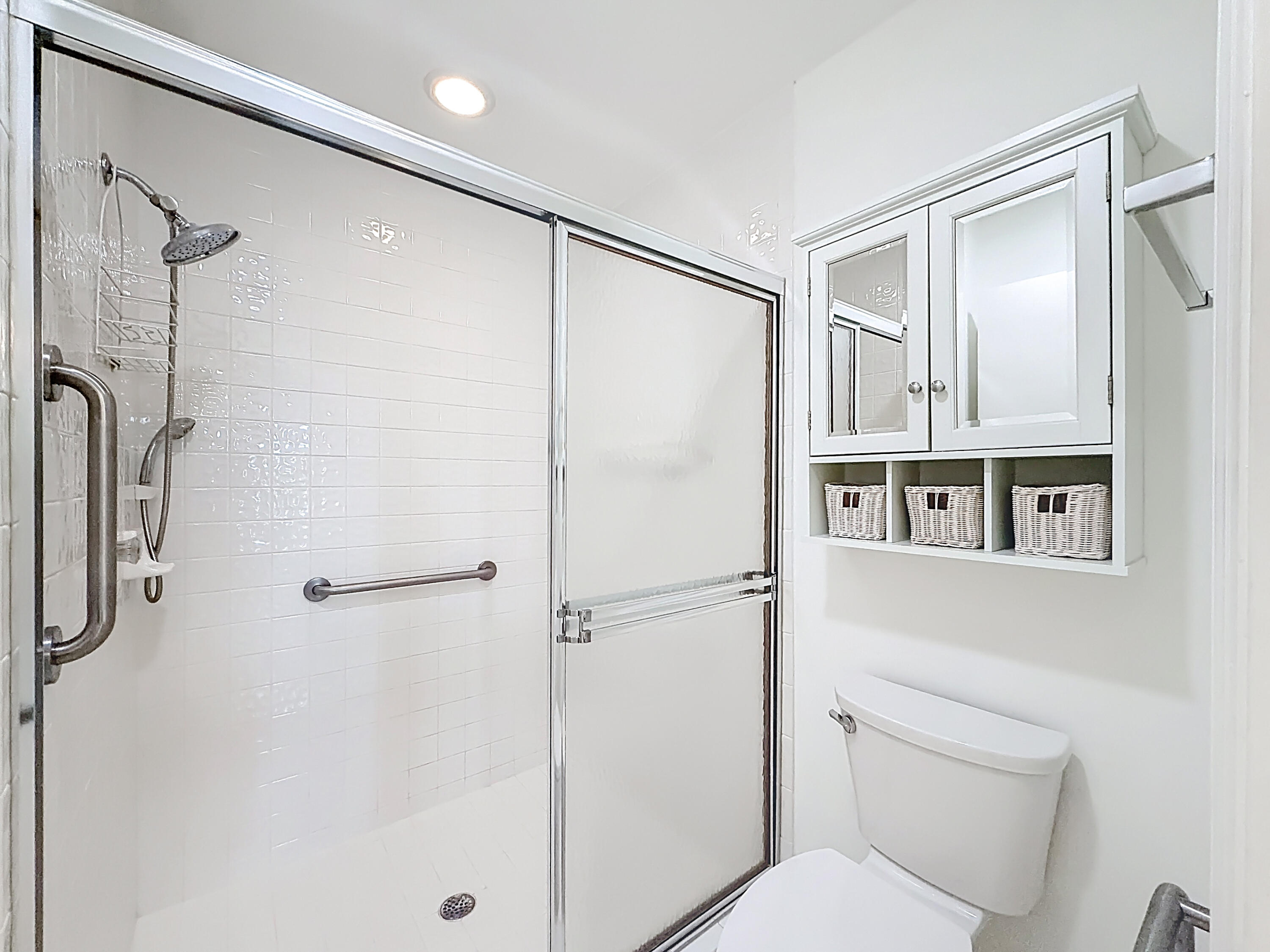 10954 Lakemore Lane Boca Raton, FL 33498 - Photo 39 of 61 a bathroom with a shower and a glass door