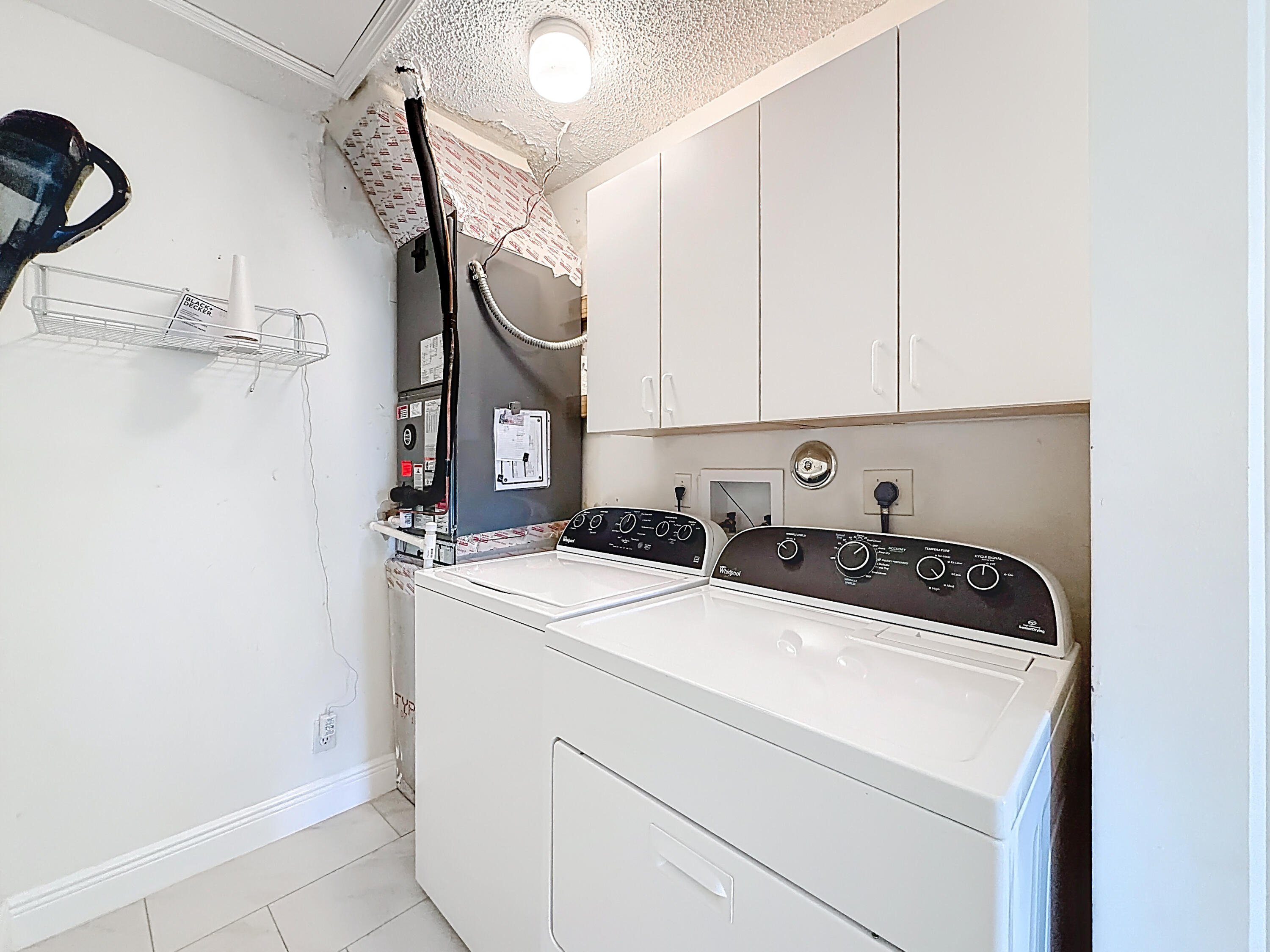 10954 Lakemore Lane Boca Raton, FL 33498 - Photo 47 of 61 a utility room with dryer and washer