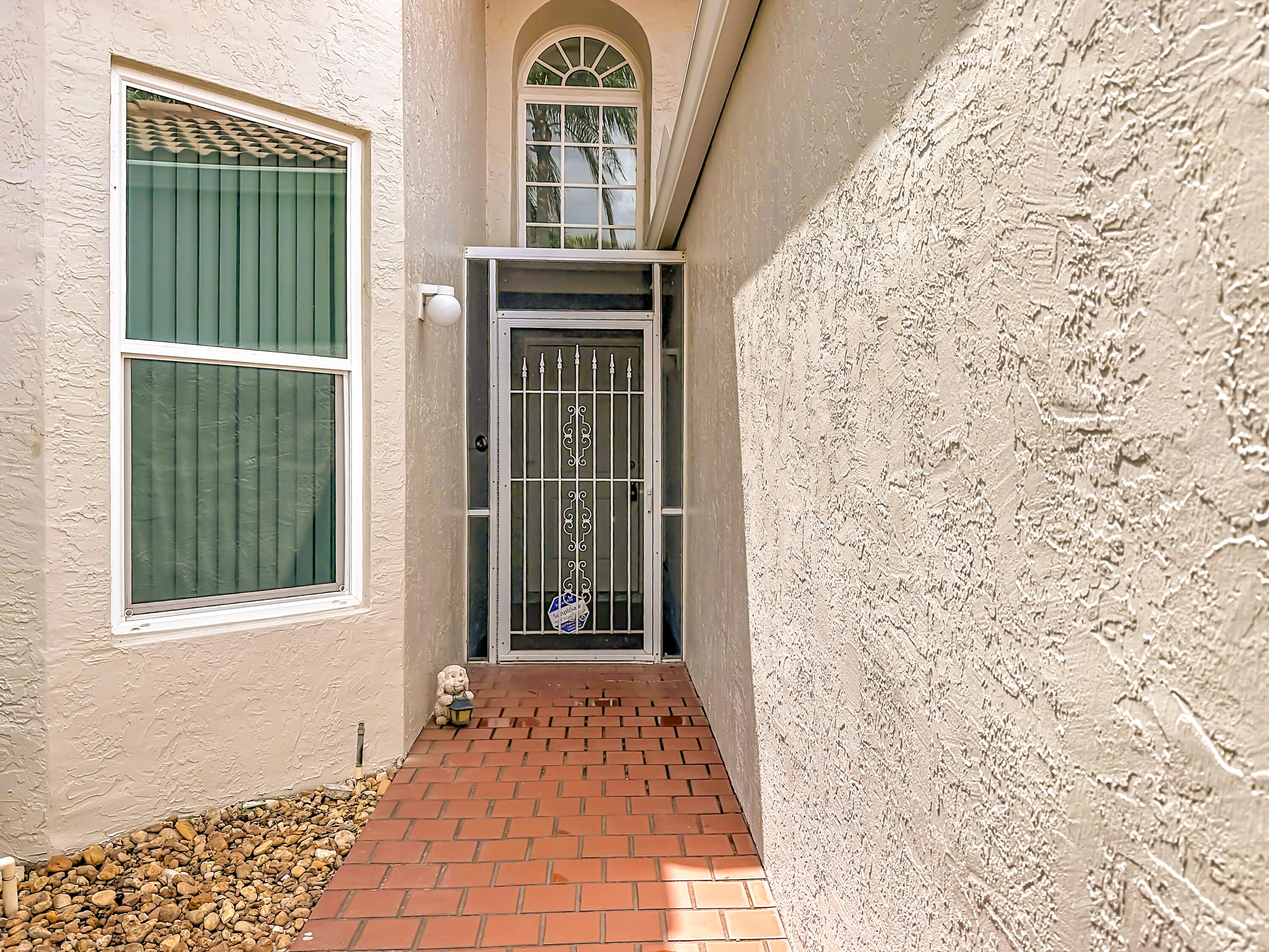 10954 Lakemore Lane Boca Raton, FL 33498 - Photo 5 of 61 a view of a door and a window