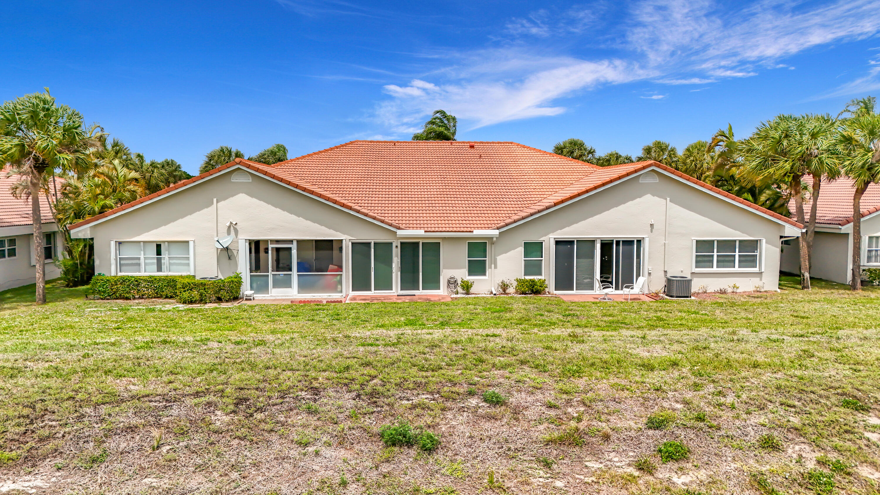 10954 Lakemore Lane Boca Raton, FL 33498 - Photo 55 of 61 a view of house with a yard