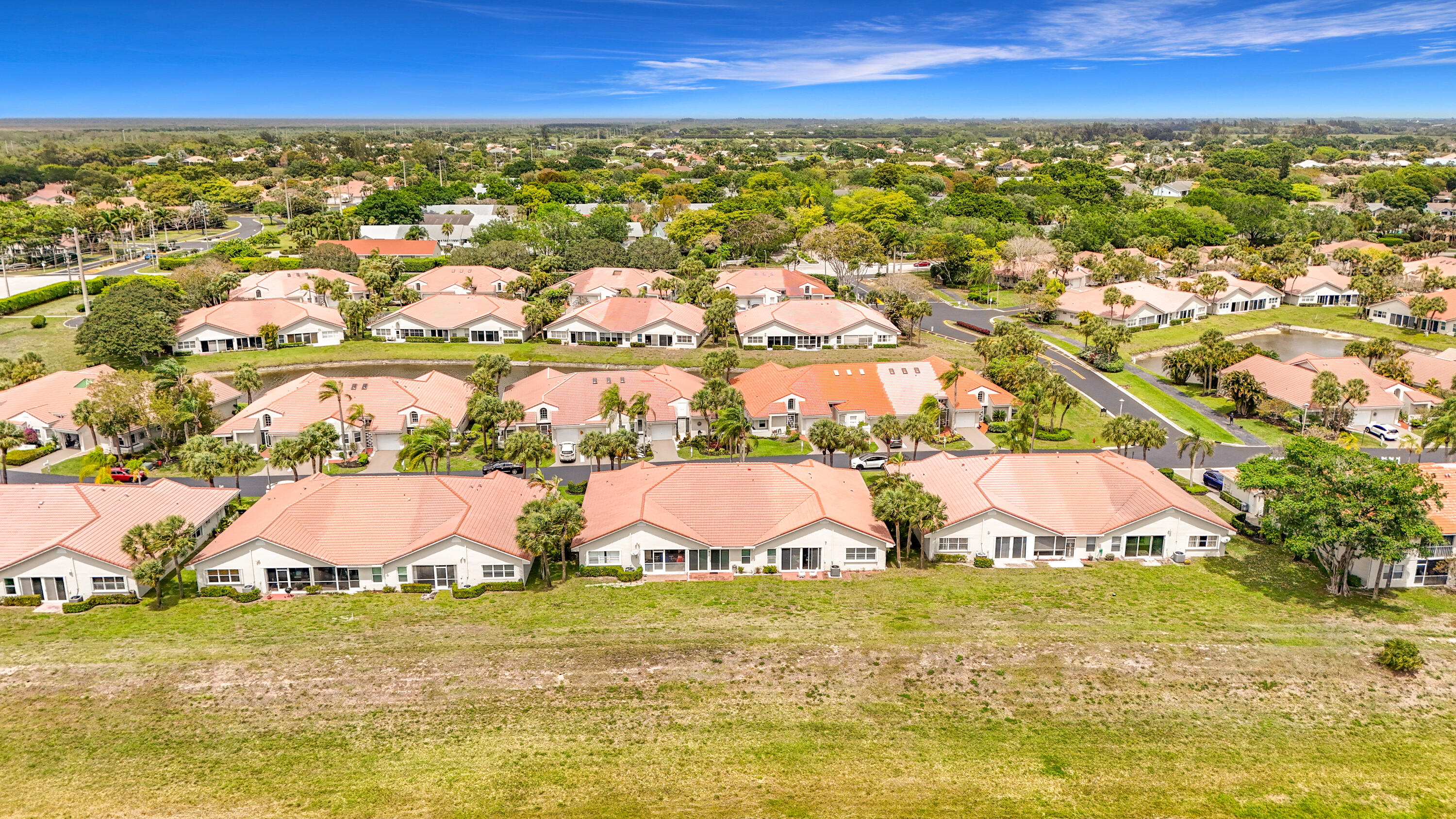 10954 Lakemore Lane Boca Raton, FL 33498 - Photo 59 of 61 a view of a city with an ocean