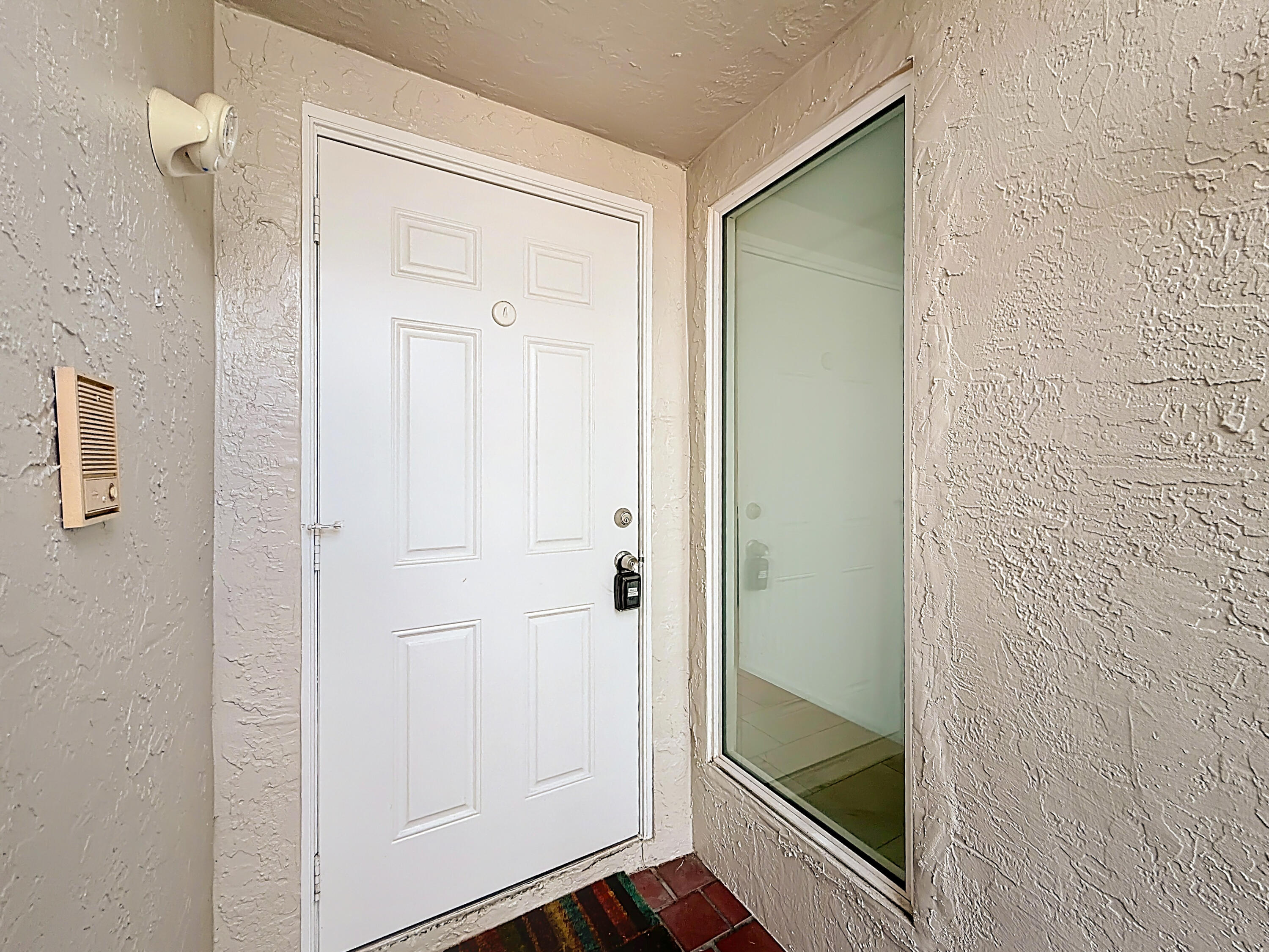 10954 Lakemore Lane Boca Raton, FL 33498 - Photo 6 of 61 a bathroom with a glass shower door