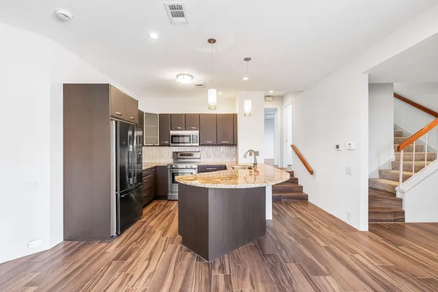 a view of a livingroom with furniture and window