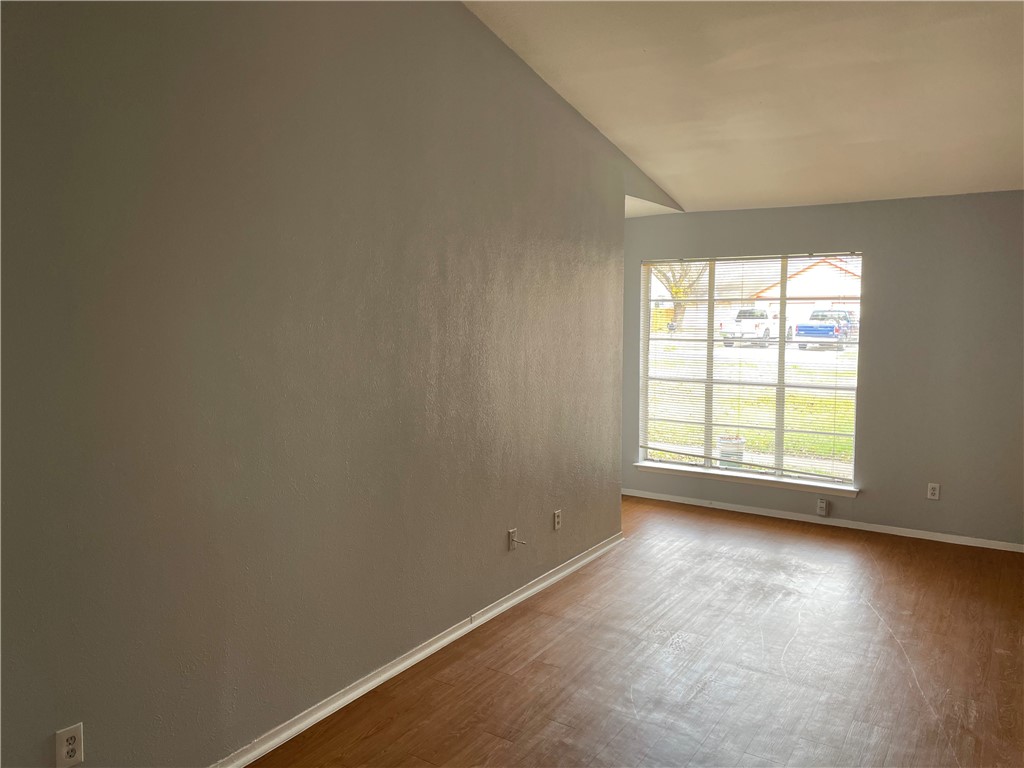 105 Meteor Drive, Unit A Austin, TX 78745 - Photo 12 of 23 an empty room with a window