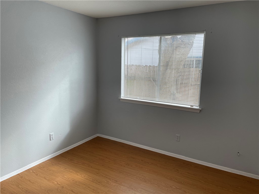 105 Meteor Drive, Unit A Austin, TX 78745 - Photo 13 of 23 an empty room with a window