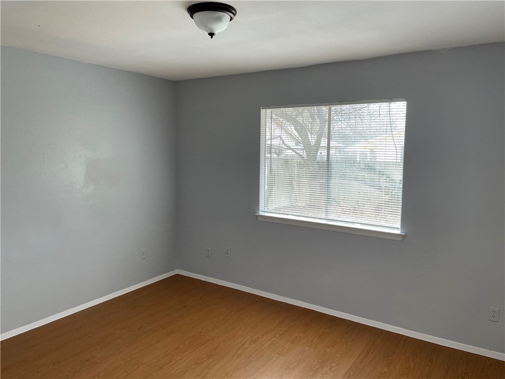 105 Meteor Drive, Unit A Austin, TX 78745 - Photo 14 of 23 an empty room with a window