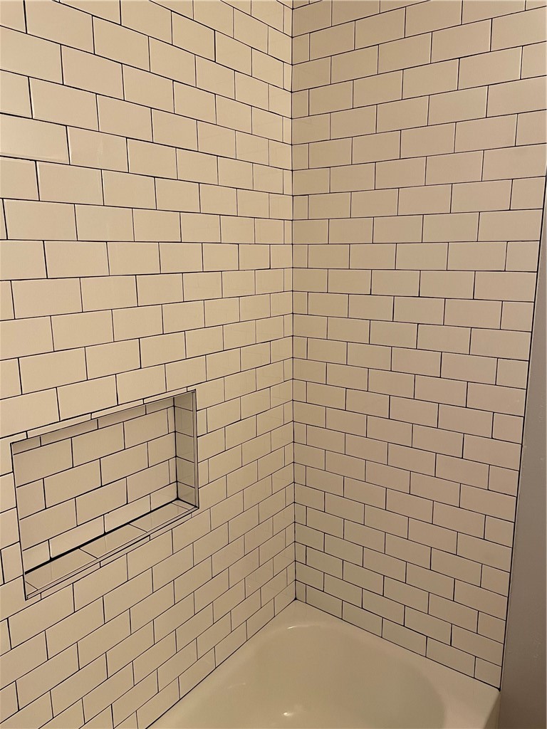 105 Meteor Drive, Unit A Austin, TX 78745 - Photo 16 of 23 a bathroom with a white wall