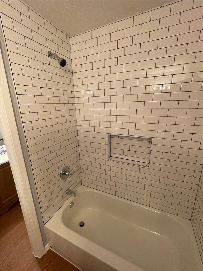 105 Meteor Drive, Unit A Austin, TX 78745 - Photo 20 of 23 a bathroom with a bathtub