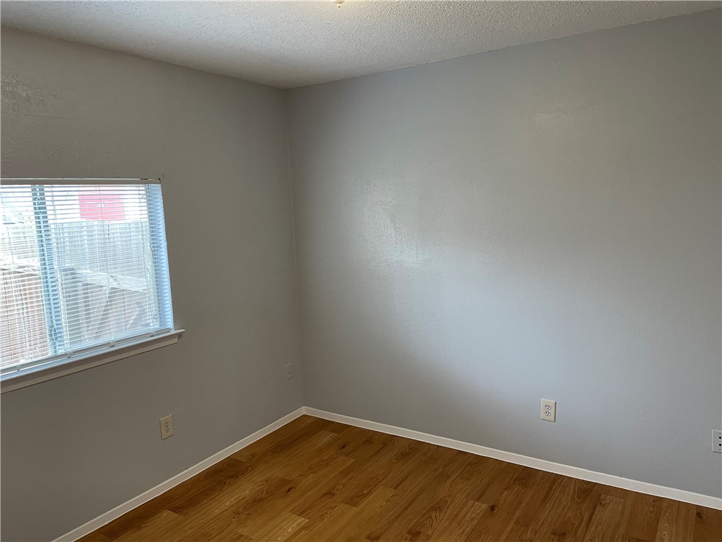 105 Meteor Drive, Unit A Austin, TX 78745 - Photo 3 of 23 an empty room with a window