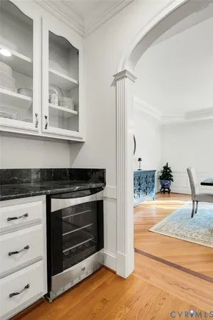 a kitchen with granite countertop a stove and a sink