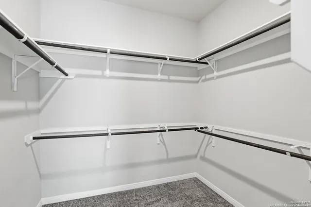 a view of a room with racks on the wall