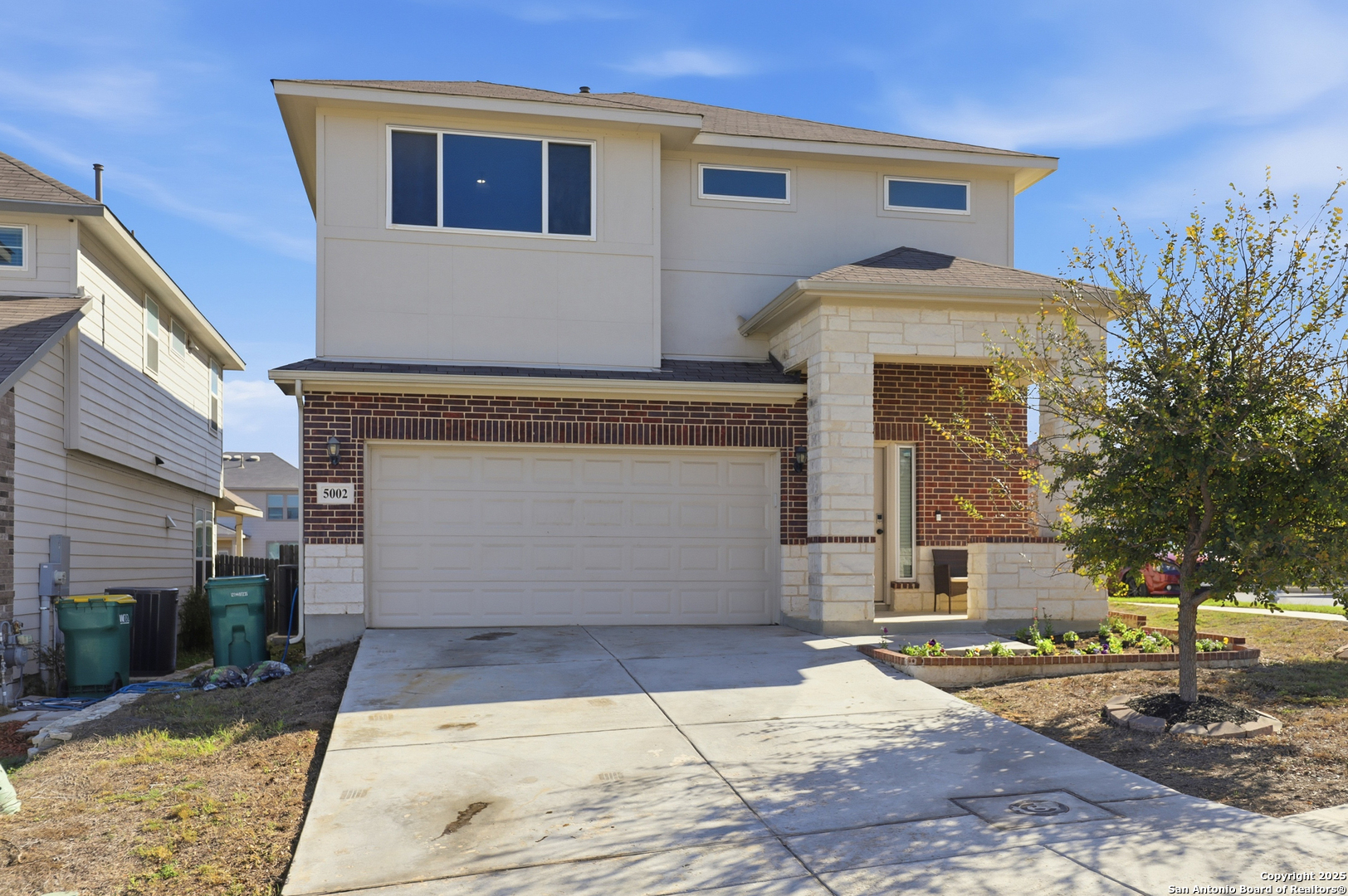 5002 Longhorn Converse, TX 78109 - Photo 2 of 36 a front view of a house with a yard