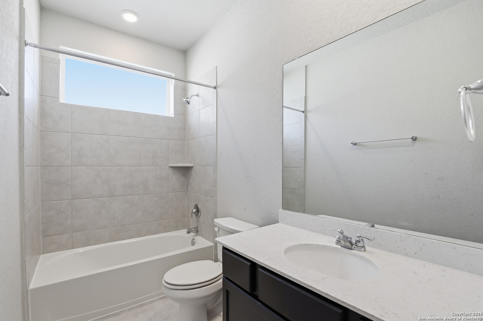 5002 Longhorn Converse, TX 78109 - Photo 26 of 36 a bathroom with a sink a toilet and shower