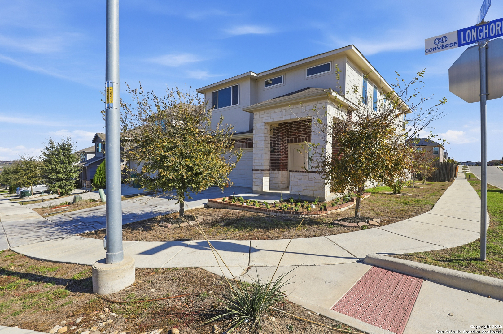 5002 Longhorn Converse, TX 78109 - Photo 3 of 36 a front view of a house with garden