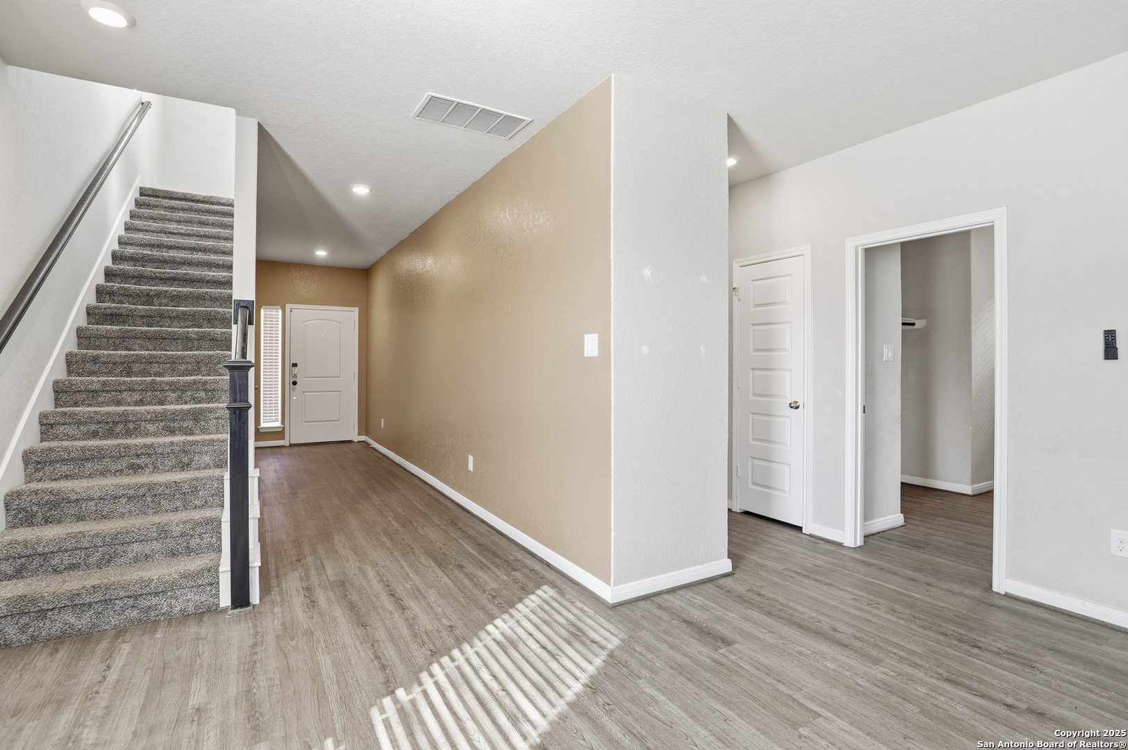 5002 Longhorn Converse, TX 78109 - Photo 6 of 36 a view of a hallway with wooden floor and entryway