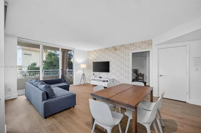 a large kitchen with a lot of counter space and a sink