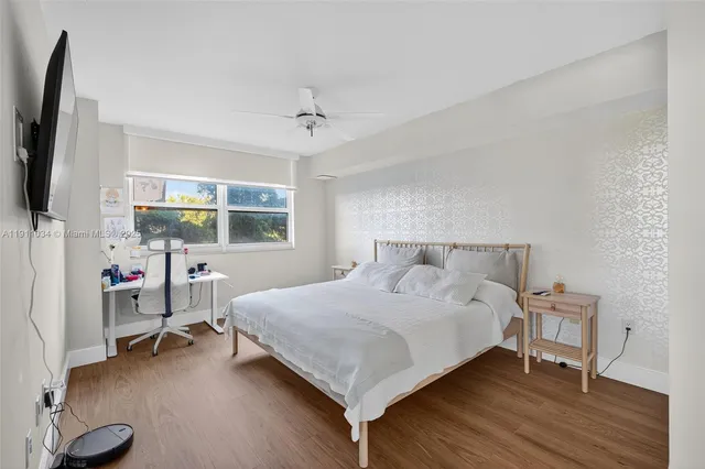 a view of a storage & utility room with dryer and washer