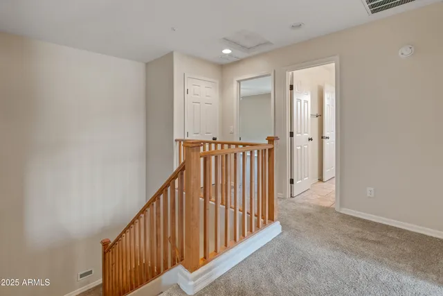 a view of a hallway with a window