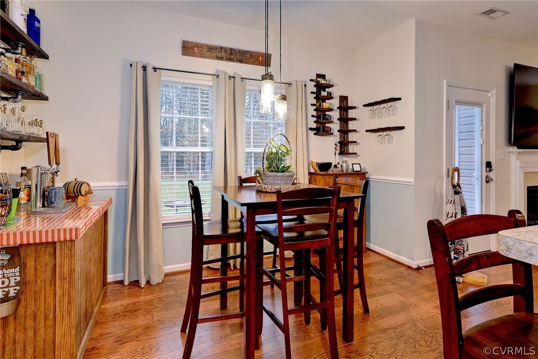 8343 Patrick Henry Way Gloucester, VA 23061 - Photo 14 of 39 a view of a dining room with furniture window and outside view