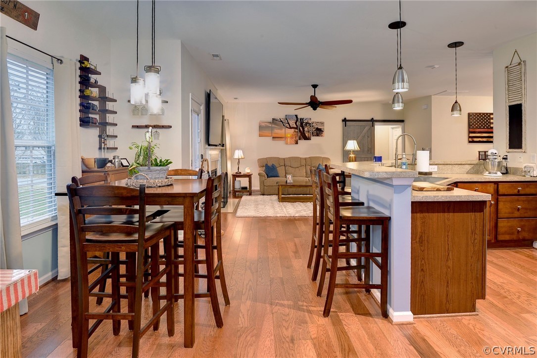 8343 Patrick Henry Way Gloucester, VA 23061 - Photo 15 of 39 a view of a dining room with furniture