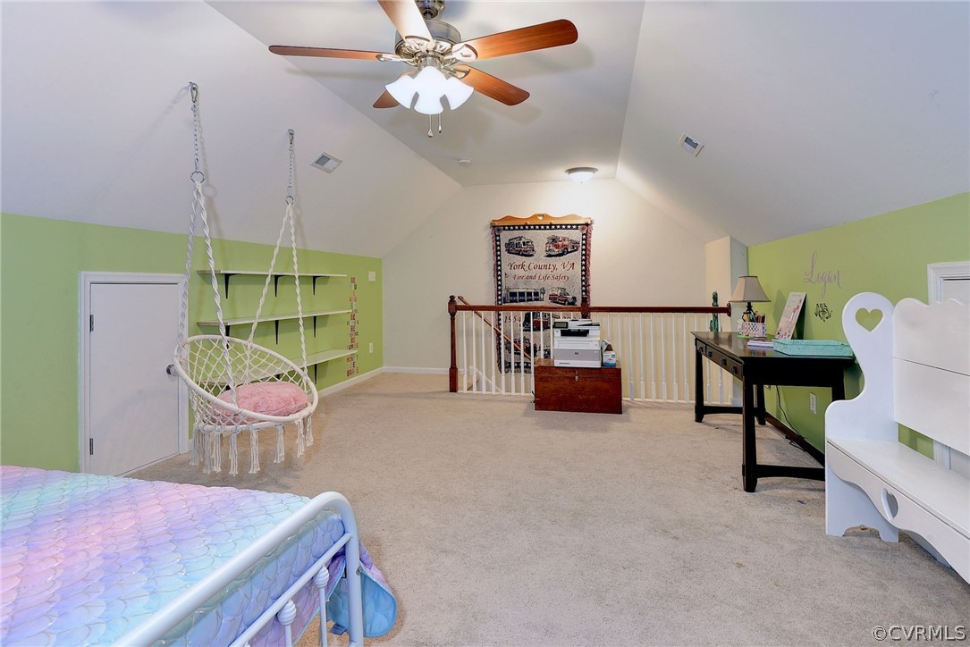 8343 Patrick Henry Way Gloucester, VA 23061 - Photo 28 of 39 a living room with furniture and a table