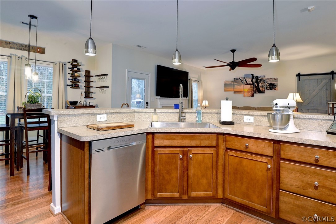 8343 Patrick Henry Way Gloucester, VA 23061 - Photo 9 of 39 a kitchen with kitchen island granite countertop appliances cabinets and a sink
