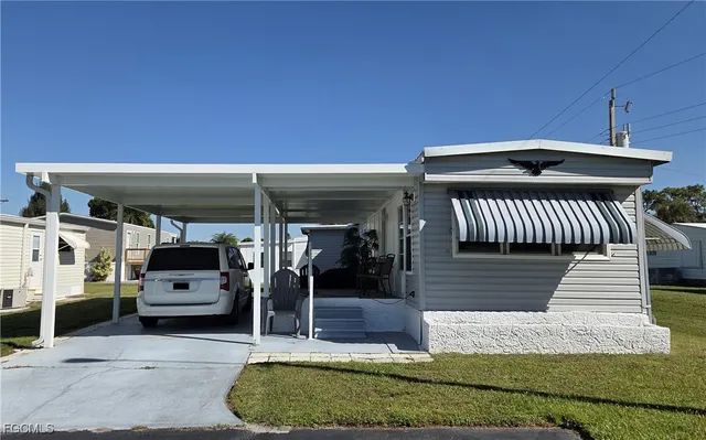 a front view of a house with a porch