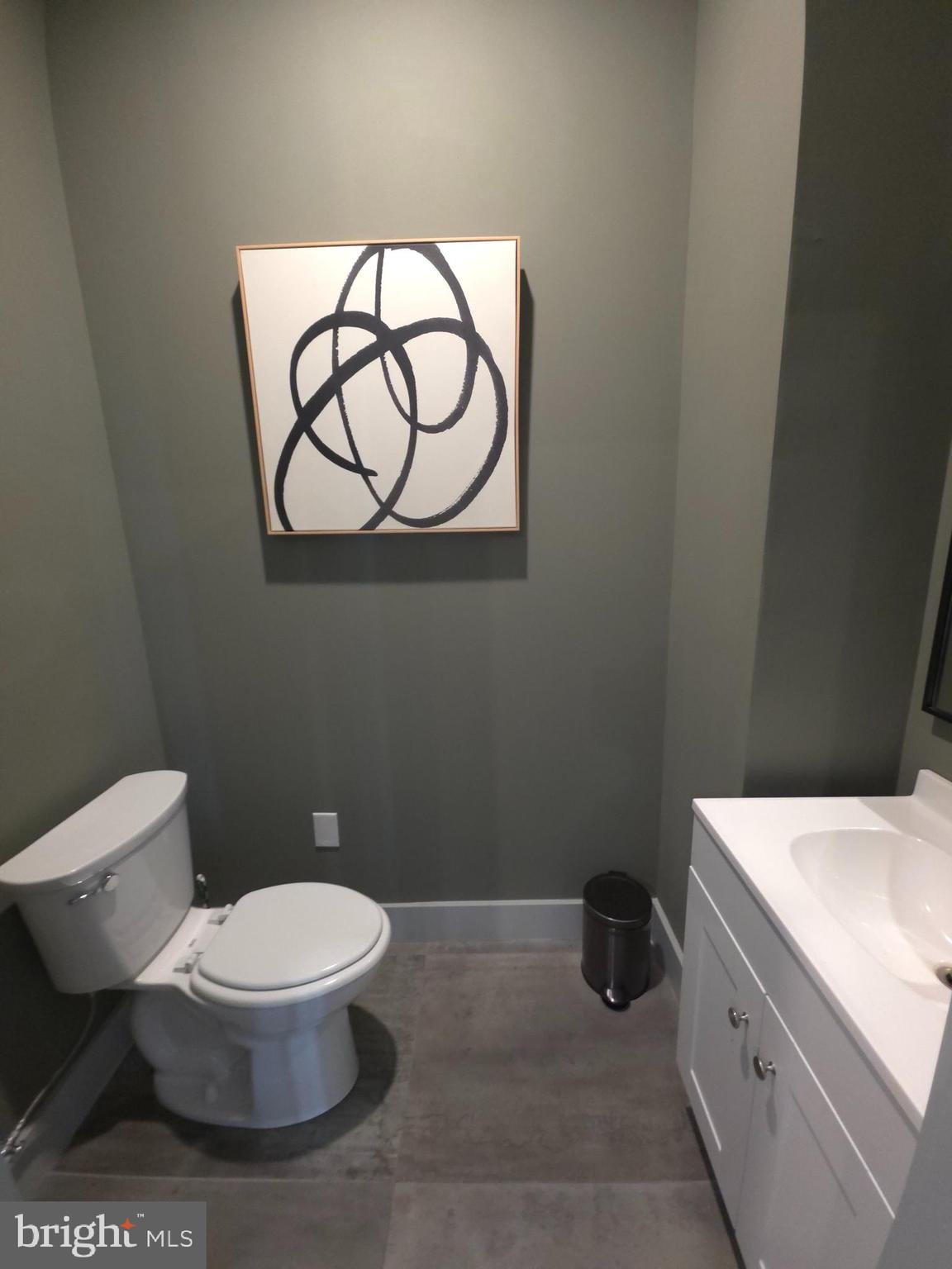 3503 Midvale Avenue, Unit 506 Philadelphia, PA 19129 - Photo 15 of 40 a bathroom with a toilet and a sink